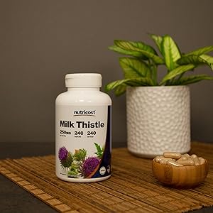 milk thistle supplement bottle and capsules